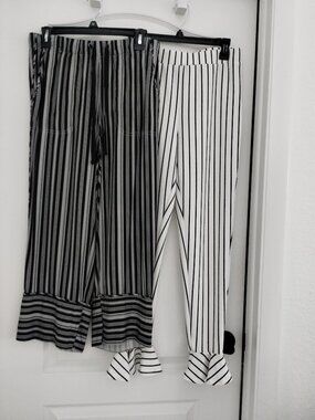 2 pair of black and white pants